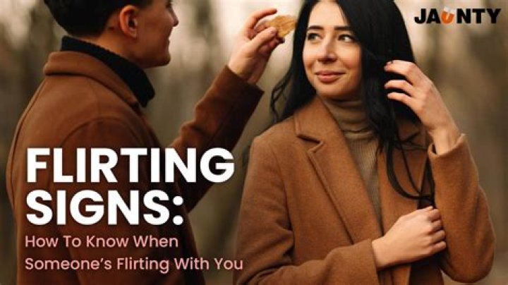 What are the signs of a guy flirting?